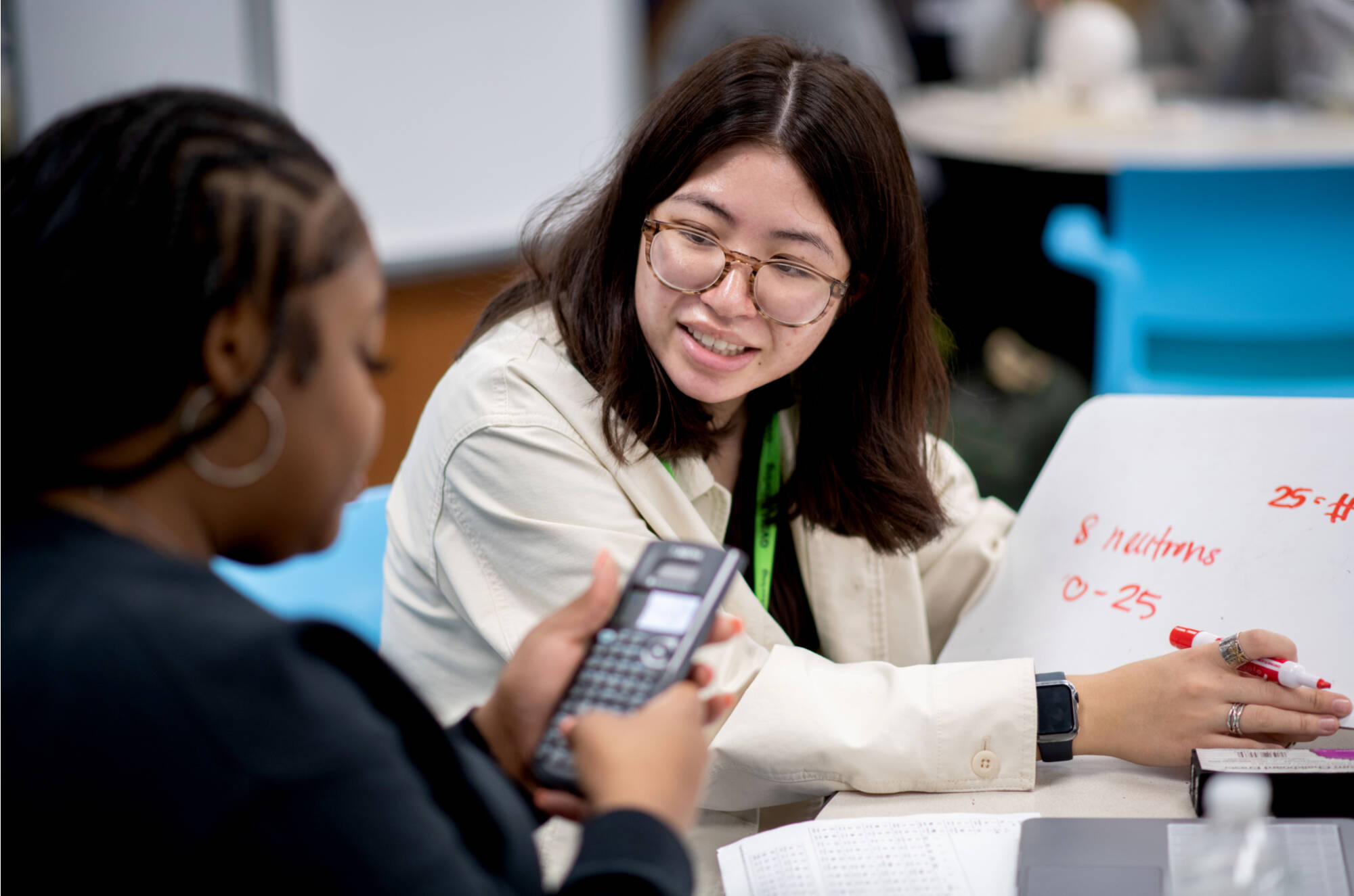 Angela Tran, right, tutors Jainell Denham Carter, left, in chemistry in the new Tutoring and Reading Center in Henry Hall September 27.(Photo releases on file)